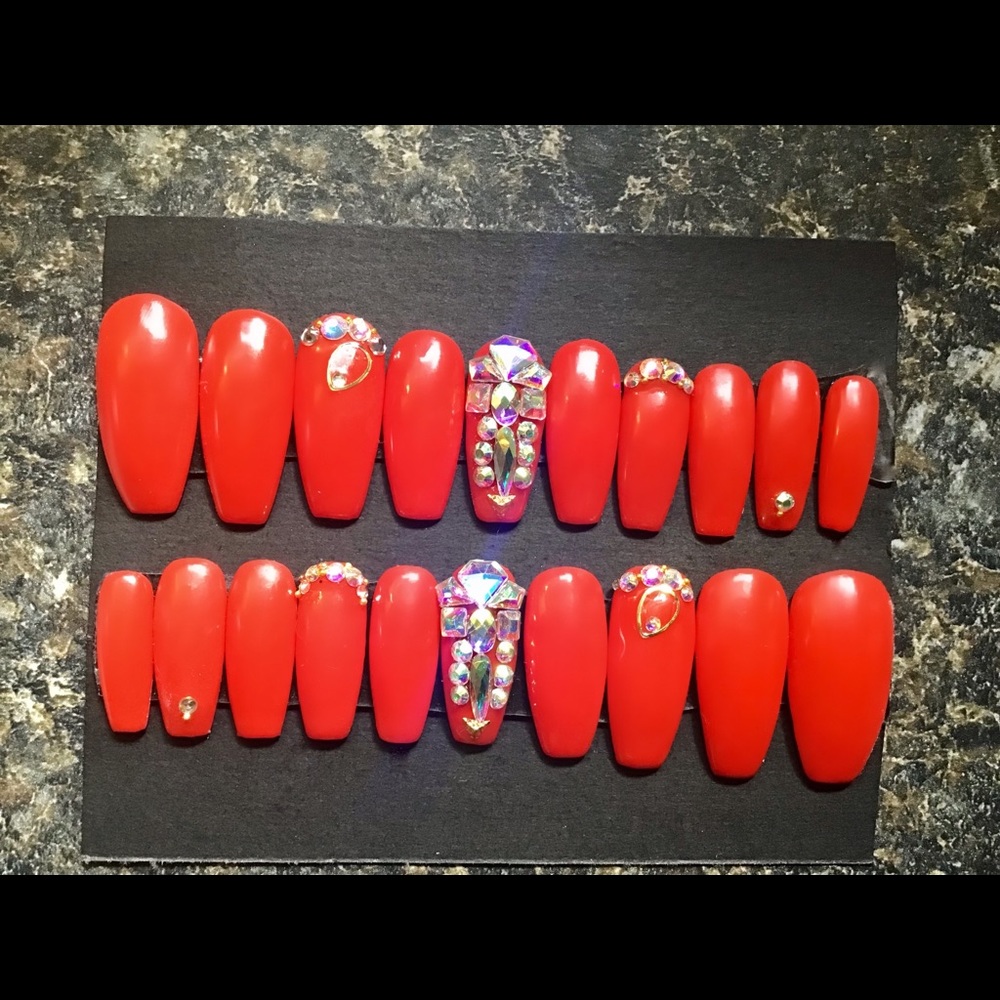Long red gels with bling